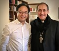 Zhang Yan with Bishop Juan Ignacio Arrieta, 