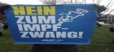 Teilnehmerin lehnt eine Pflichtimpfung ab.