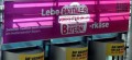 Durch die Wirklichkeit bereits überholte Werbung von XPLR-Media-in-Bavaria über dem ICM-Eingang.