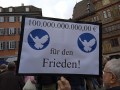 Demoteilnehmer mit Plakat. Tübingen, 19.11.2022
