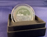 Münze in der Schachtel