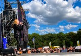     Carol Decker of T’Pau captivates fans with an energetic live performance.